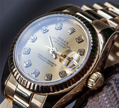 Polished gold watch